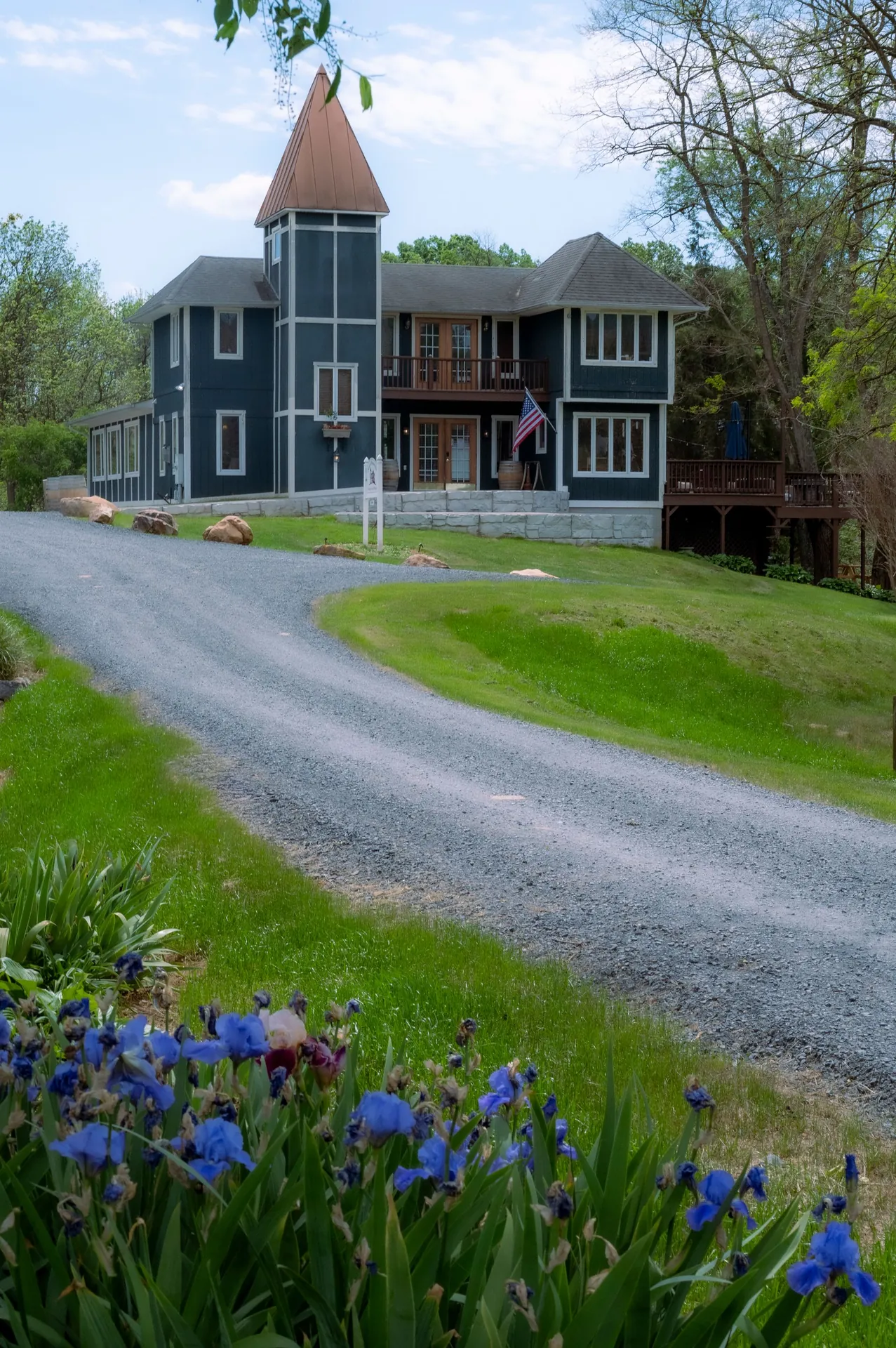 Clean gravel driveway leading up to a house